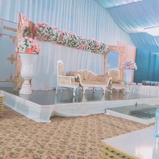 Buffet service under draped ceiling with chandeliers